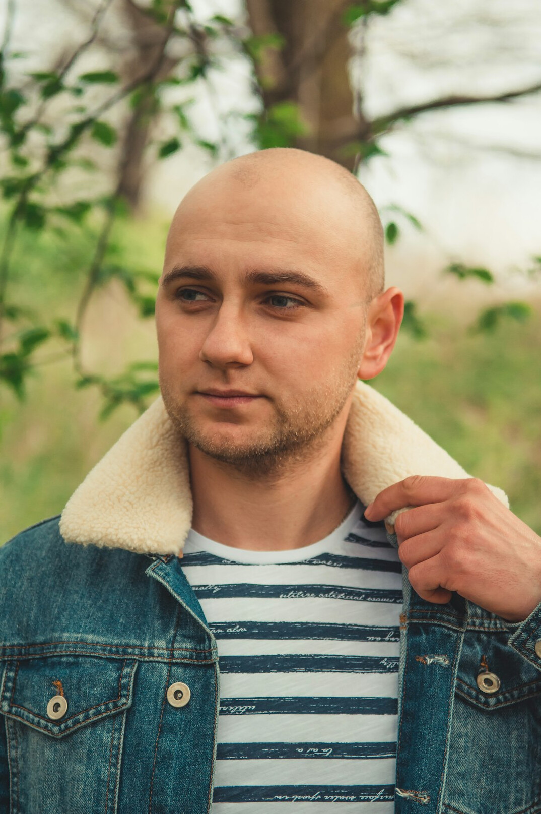 Portrait of a man with short hair and a light beard